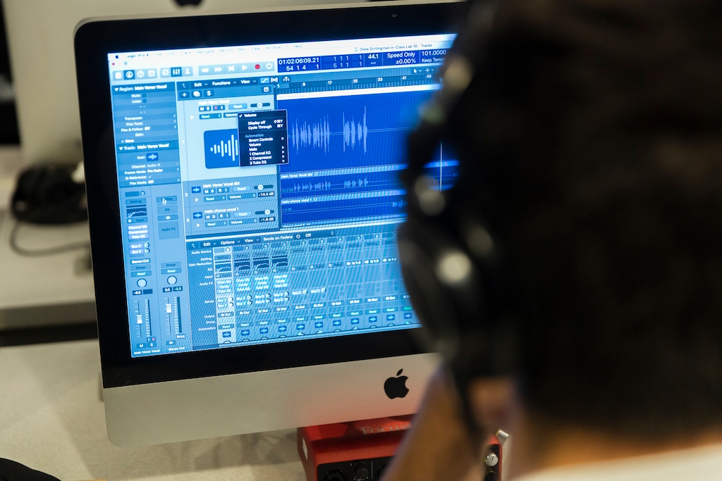 Image of a student working in an digital audio program on a desktop computer